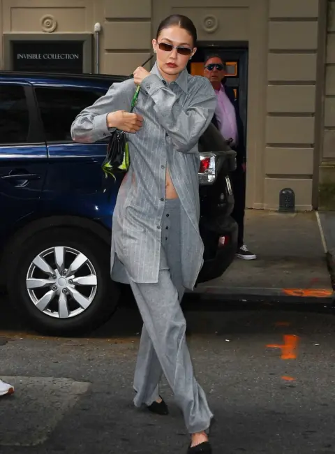 Gigi Hadid Steps Out in a Gray Look for The Human Situation Exhibition in NY 05-08-25