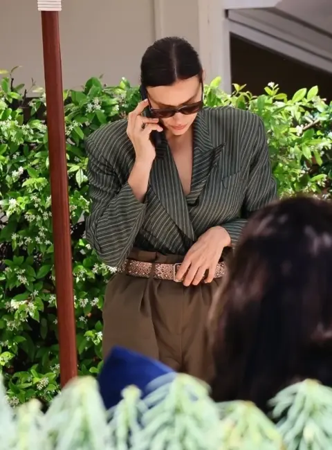 Irina Shayk Spotted Multitasking at Hotel Martinez in Cannes While Enjoying Lunch 05-15-25