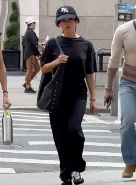 Jenna Ortega in Black T-shirt and Black Cap exits the Mark Hotel in New York  05-03-25