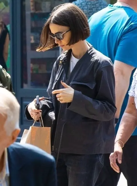 Lily Collins out in London streets 05-04-25