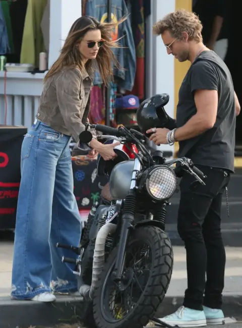 Alessandra Ambrosio Takes a Vintage Ride with Buck Palmer Through Venice 06-22-25