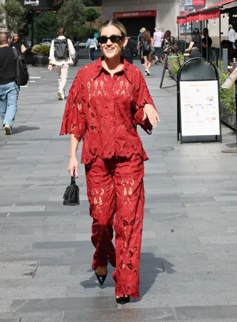 Ashley Roberts Turns Heads in Vibrant Red Sheer Outfit Outside Heart Radio Studios 06-25-25