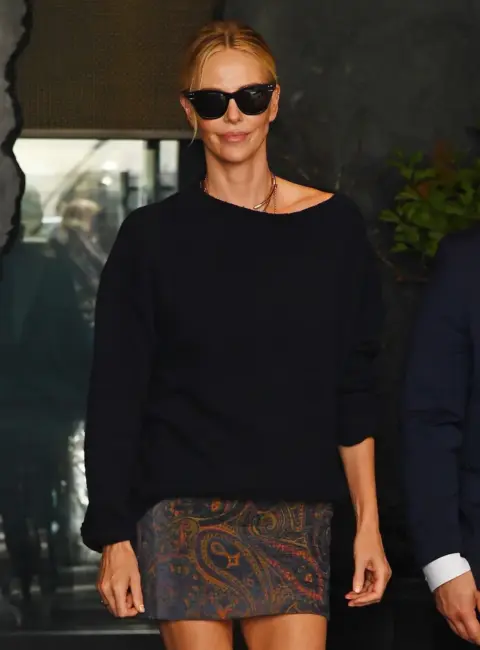 Charlize Theron Leaves the Aman Hotel in New York 06-24-25