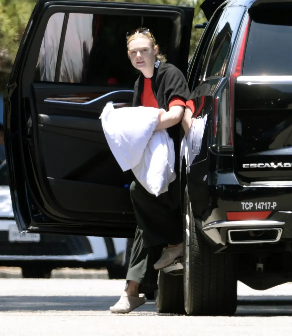 Elle Fanning’s Quick Bite: McDonald’s Stop Before Heading to an Airport in Los Angeles 06-02-25