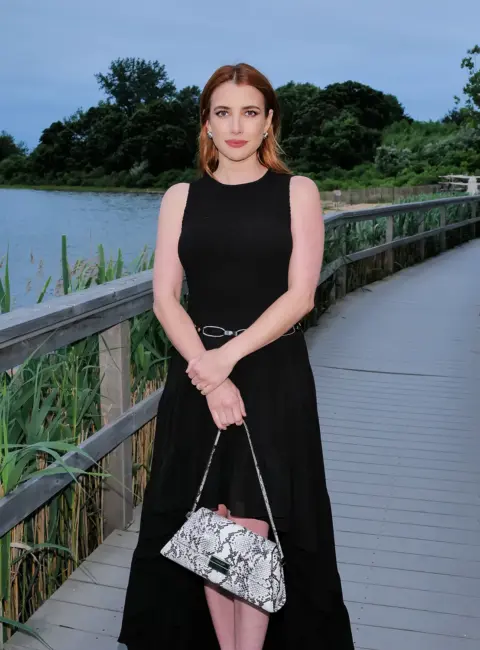 Emma Roberts – Micheal Kors Event in Montauk Yacht Club 06-24-25