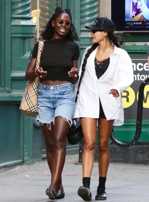 Jodie Turner-Smith Radiates Joy in Denim Shorts and Burberry on a Casual Day Out in SoHo with Bestie Nancy 06-20-25