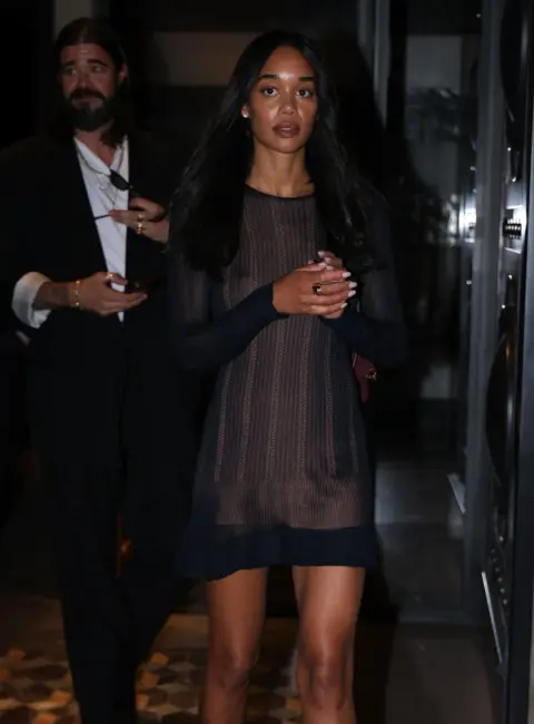 Laura Harrier Turns Heads with a Mystery Man at Le Costes in Paris 06-23-25