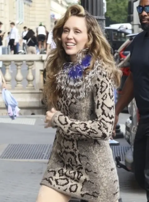 Miley Cyrus Turns Heads in Animal Print Dress and Valentino Bag in Paris 06-17-25