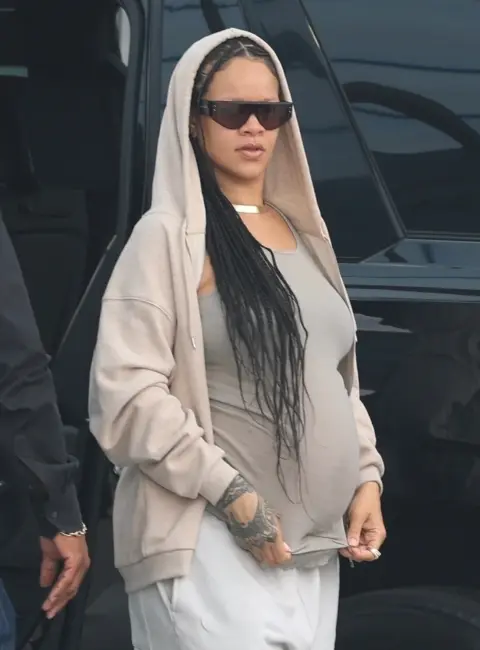 Rihanna Rocks Comfy Style and Flaunts Growing Baby Bump at LAX 06-24-25