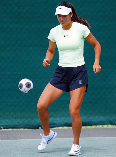 Emma Raducanu Takes a Break for Soccer at Wimbledon Practice Courts in London 07-03-25