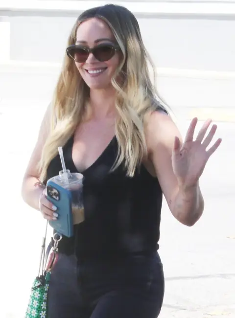 Hilary Duff Radiates Joy as She Greets Fans Outside Joan’s on Third Post Working Lunch 07-09-25