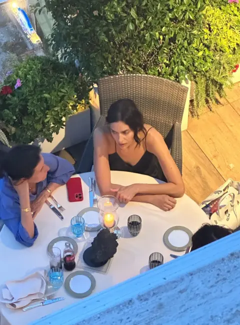 Irina Shayk Indulges in Candlelit Dinner with Friends at Rooftop-Style Restaurant in Naples 07-26-26