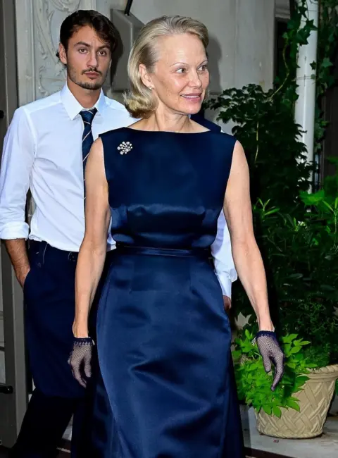 Pamela Anderson and Sons Attend The Naked Gun Premiere in New York 07-28-25