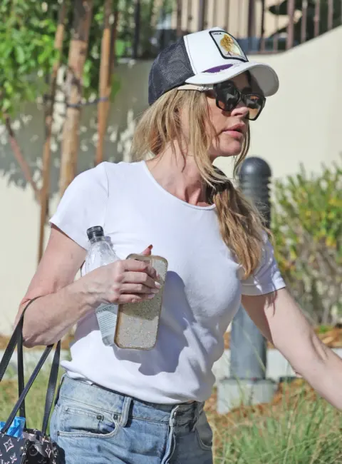 Denise Richards Rocks a Stunning Pout in the Streets of LA 08-16-2025