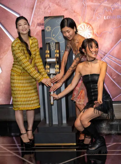 Rei Ami, Arden Cho and May Hong – Lights the Empire State Building to Kick off ‘kpop Demon Hunters’ Golden Weekend 08-22-2025
