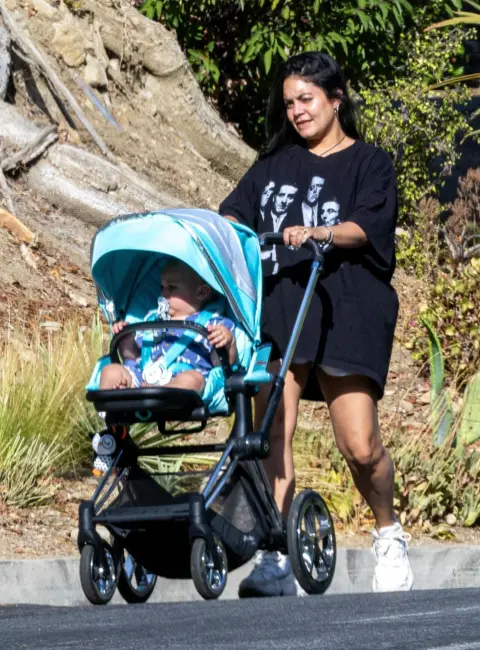Vanessa Hudgens Rocks Goodfellas T-shirt While Out for a Stroll with Her Child in Los Angeles 08-04-2025