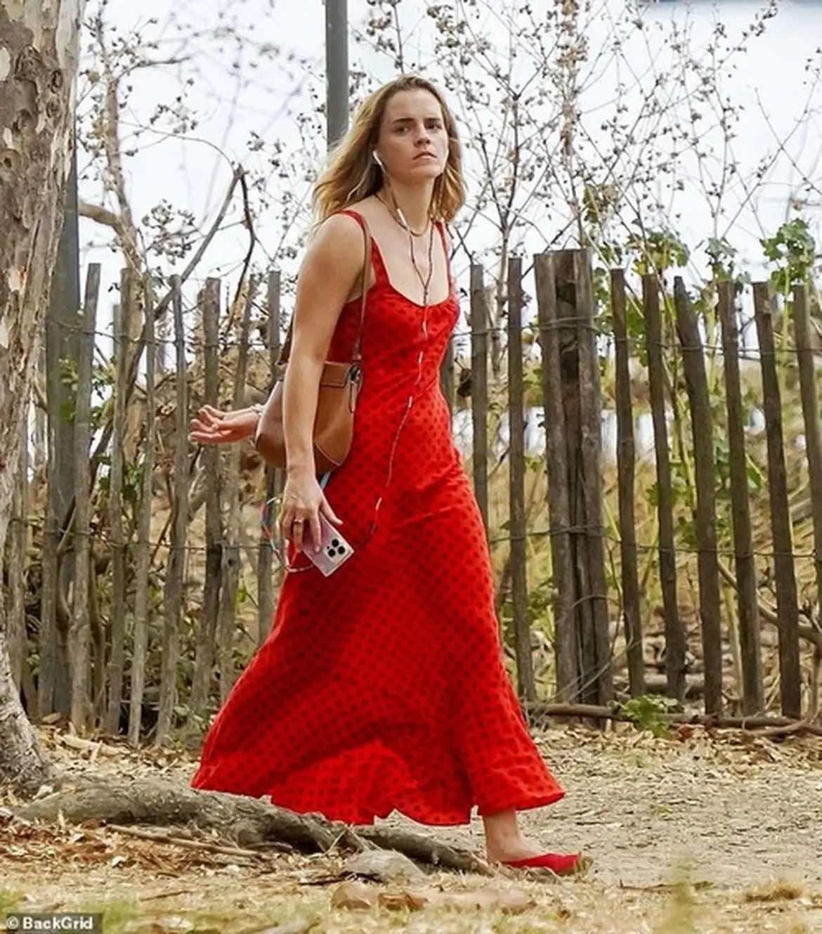 Emma Watson Stuns in Red Dress in Saint Tropez 08-28-2025