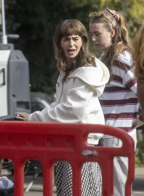Lily Collins On the Set of Upcoming Film ‘Close Personal Friends’ in London, England 09-18-2025