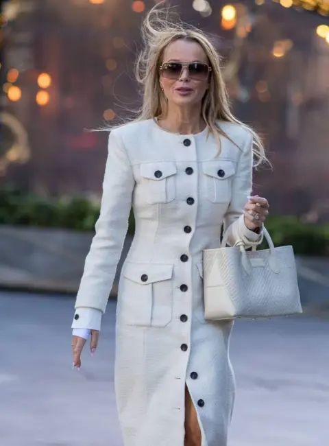 Amanda Holden – Looks Gorgeous in Midi Dress as She Leaves Global Radio Studios After Presenting Her Heart Breakfast Radio Show in London 10-06-2025