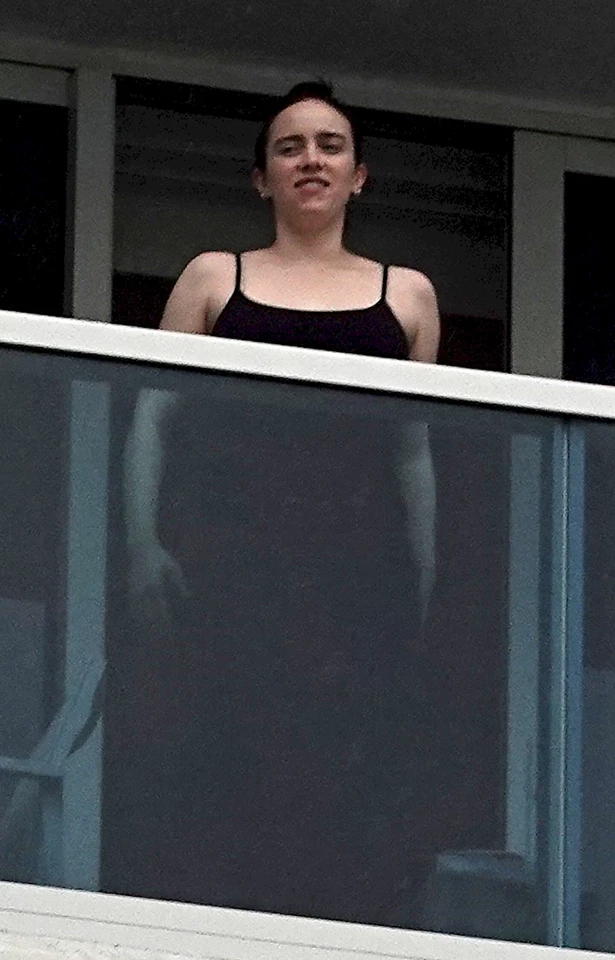 Billie Eilish Stuns in Black Maxi Dress on Her Hotel Balcony in Miami 10-12-2025