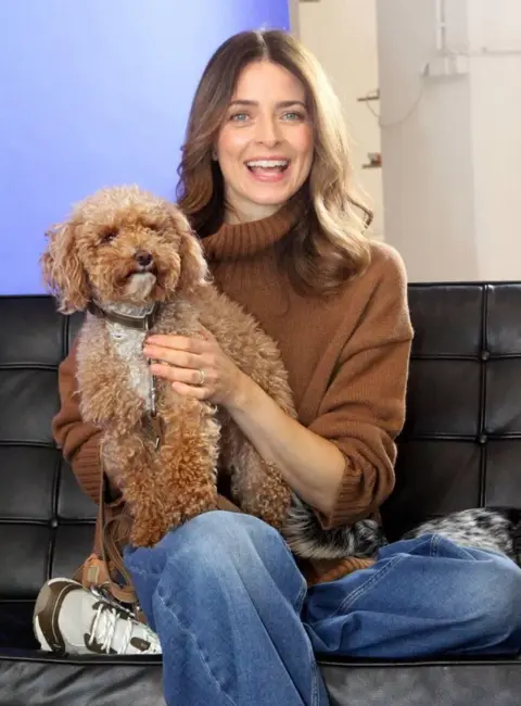 Eva Padberg and dog Emmy – World Dog Day Photocall  at the Blank Studios in Hamburg, Germany 10-09-2025