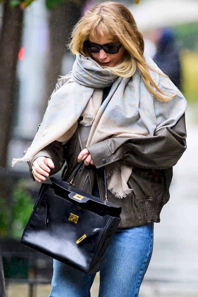 Jennifer Lawrence Stuns in Rainy Day Style in New York City 10-13-2025