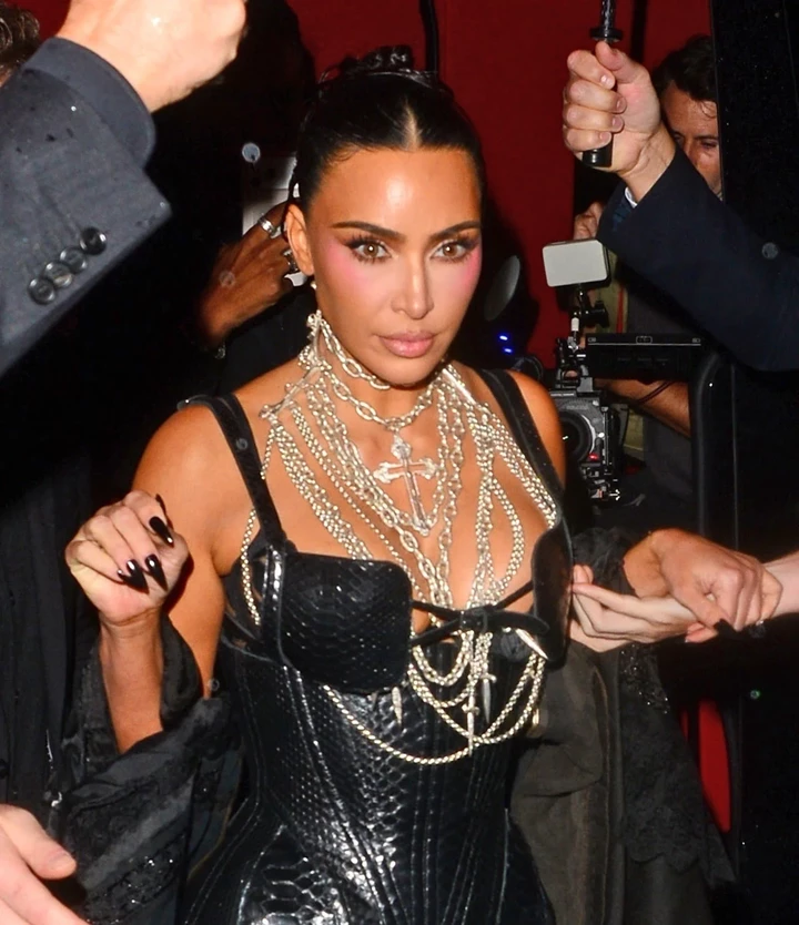 Kim Kardashian Stuns in a Black Leather Bondage Dress at ‘All’s Fair’ Premiere Afterparty in London 10-22-2025