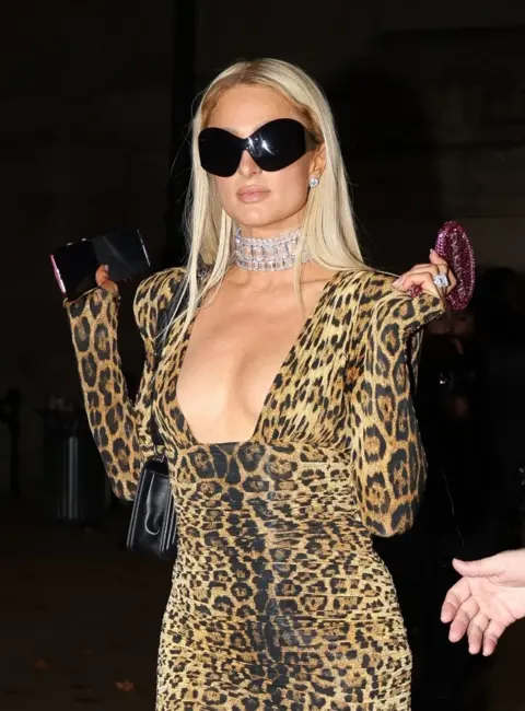 Paris Hilton Stuns in a Glamorous Pose at the Grand Palais Party in Paris 10-03-2025